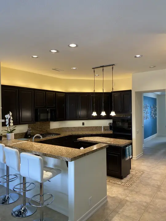 Dark Stained Kitchen Cabinets Breakfast Bar La Quinta Ca