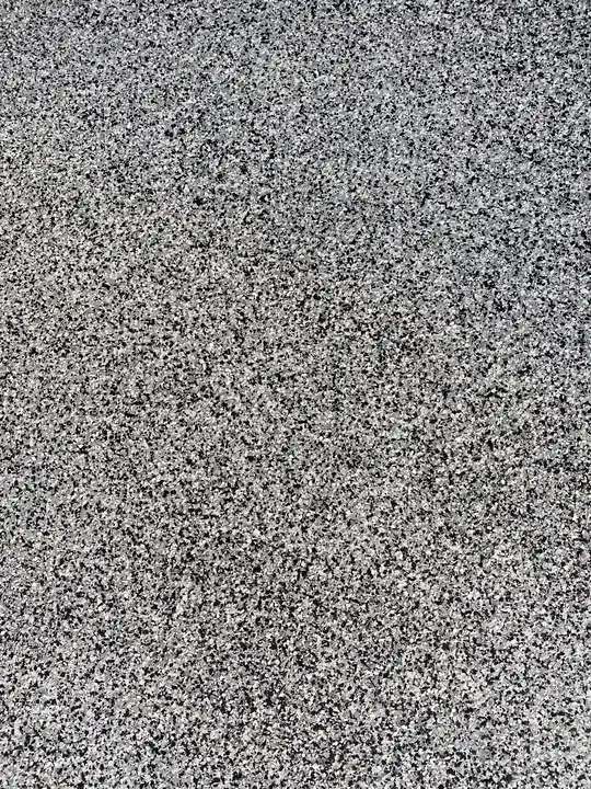 Grey And White Flake Floor Coating Close Up La Quinta Ca